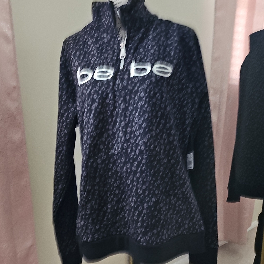 Bebe Black and White Patterned Half-Zip Top